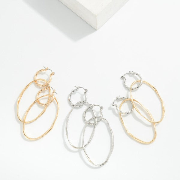 279648 Metal Tone Linked Twisted Hoop Oval Drop Earrings