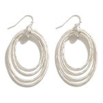 Worn Metal Drop Earring With Tapered Circular Drops