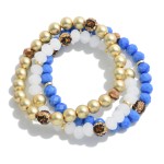 White and blue Set of Three Game Day Beaded Bracelets Featuring Rhinestone Studded Beads.