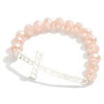 Blush pink Silver Cross Stretch Bracelet Featuring Faceted Beads